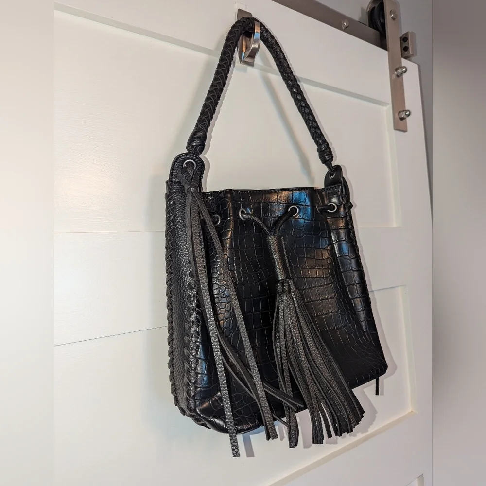 Like New Black Leather Wrangler braided shoulder bag. Black purse. Fring…